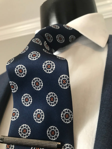 Dark blue and white with a splash of orange Tie set