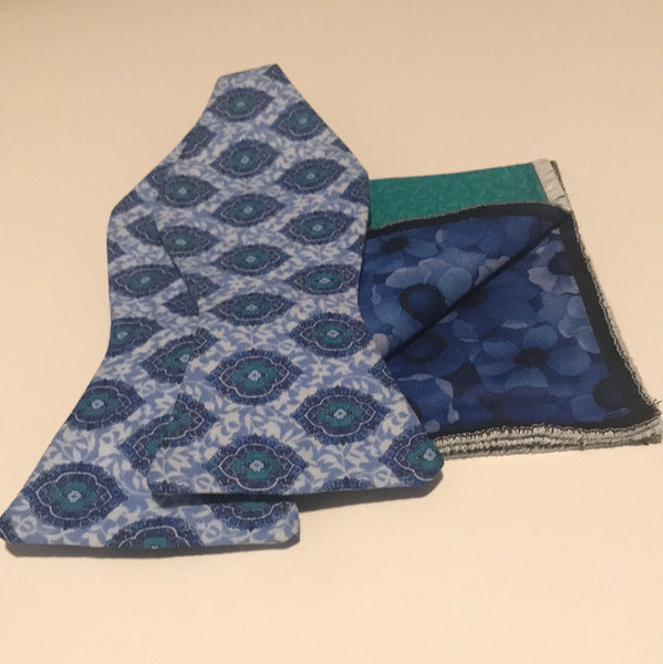 Light blue print with hints of green and dark blue Bowtie set