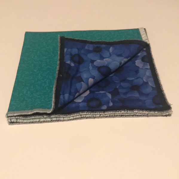Light blue print with hints of green and dark blue Bowtie set